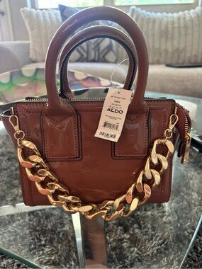 NWT: ALDO Glossy Mauve Purse with Gold Chain Handle